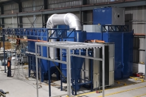 Blue powder coating machine at a sheet metal fabrication company in Malaysia